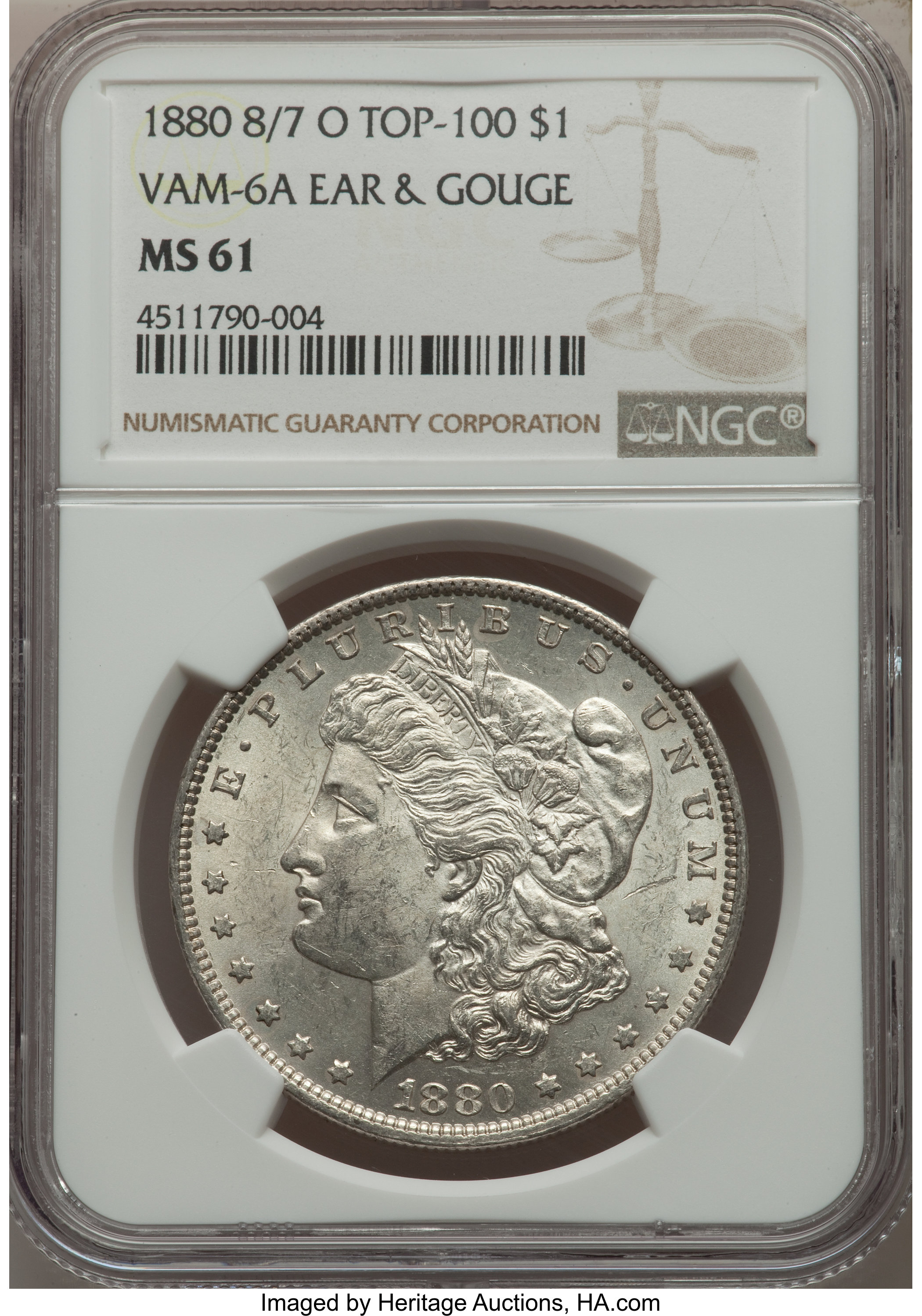 1880-O $1 8 Over 7 Ear & Gouge, VAM-6A, MS61 NGC. TOP-100. NGC Census: (37/102). PCGS Population: (12/111). MS61....