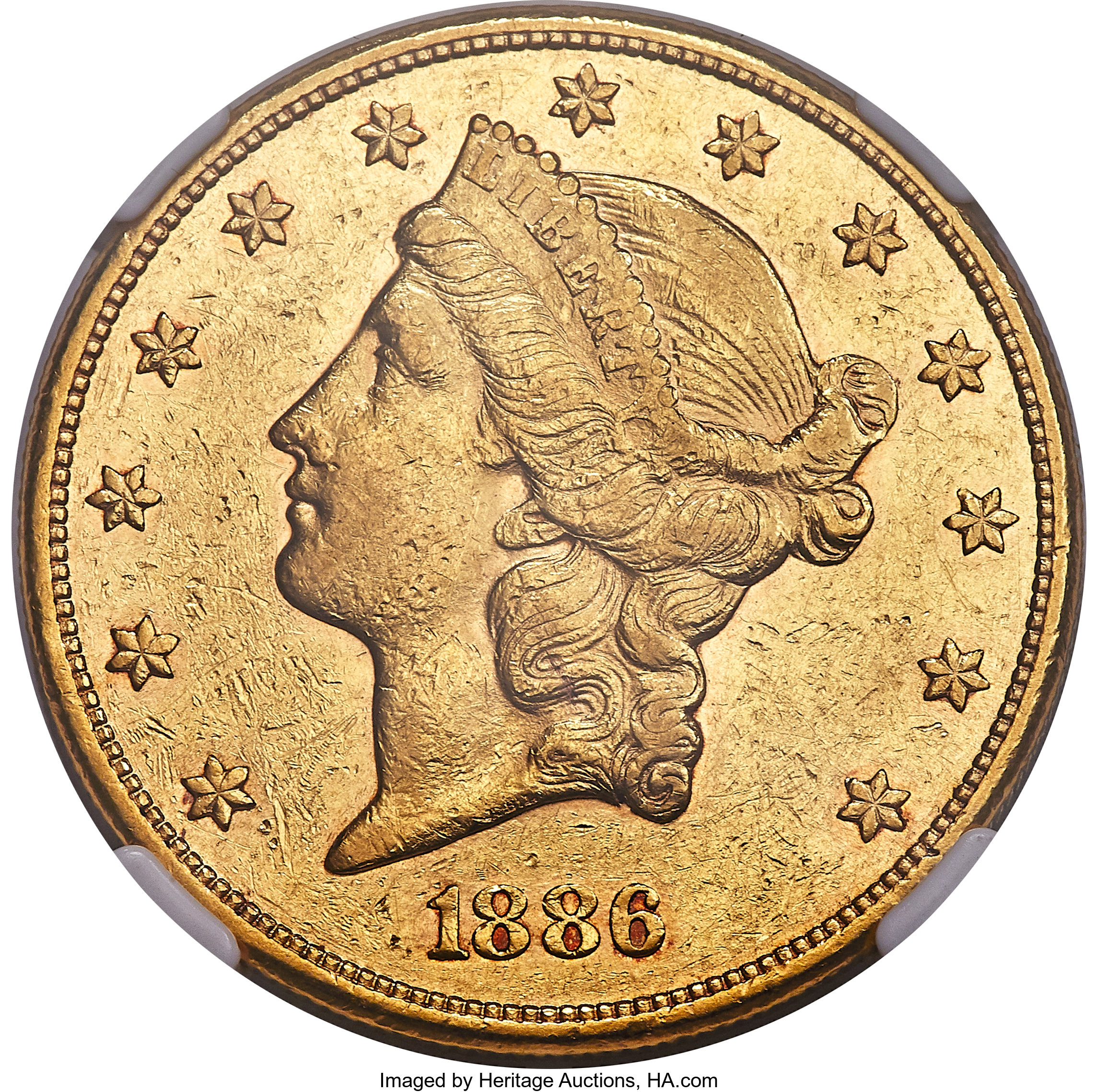 image for: 1886 $20 AU50+ NGC....