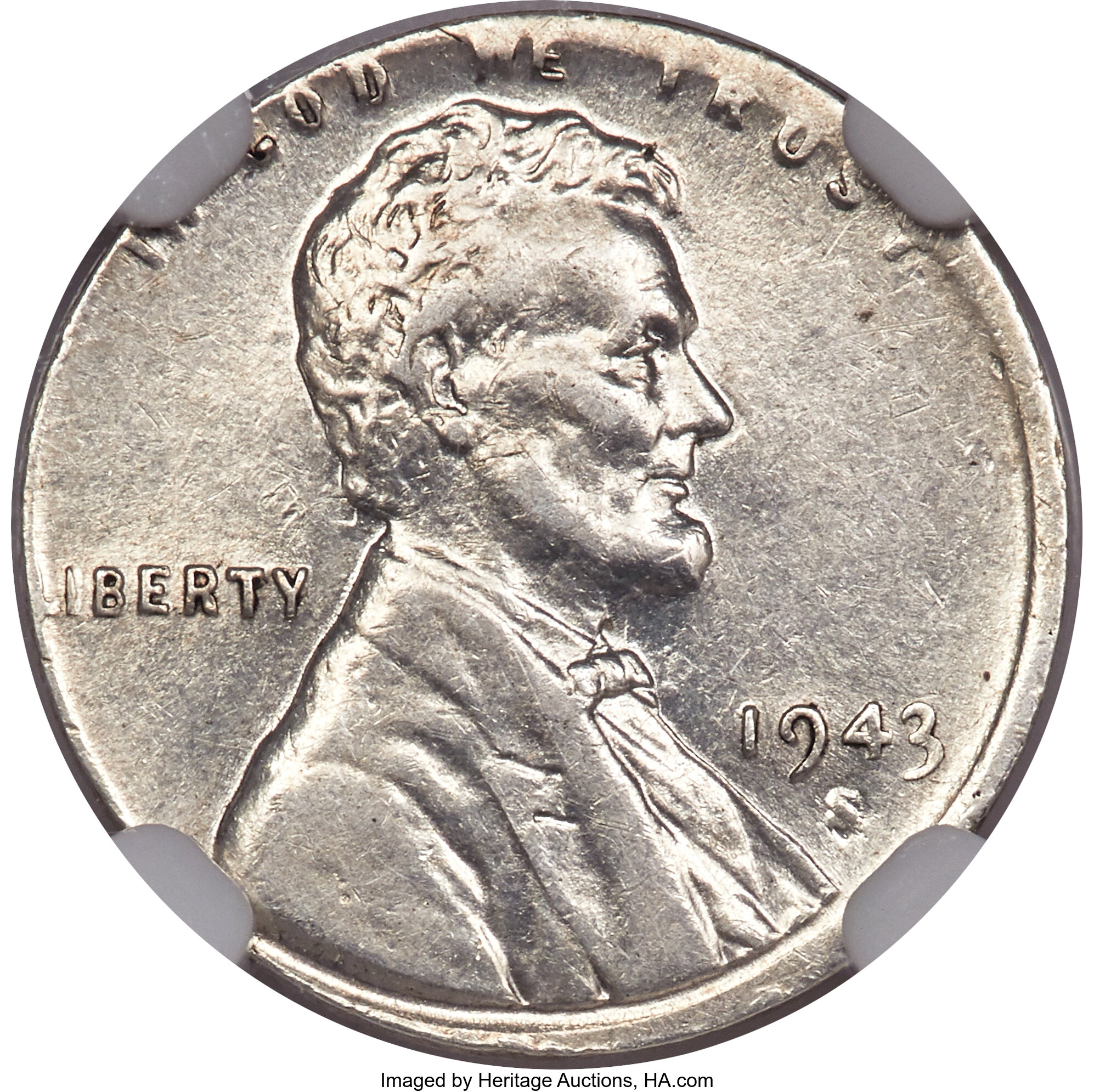 1943-S 1C Lincoln Cent -- Struck on a Silver Dime Blank -- AU53 NGC. (2.5 grams). Most peripheral legends are readable desp...