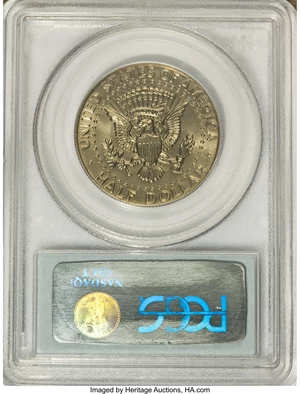 image for: 1973 50C MS65 PCGS. Lot also includes a 1987-P Kennedy Half MS66 PCGS.... (Total: 2 coins)