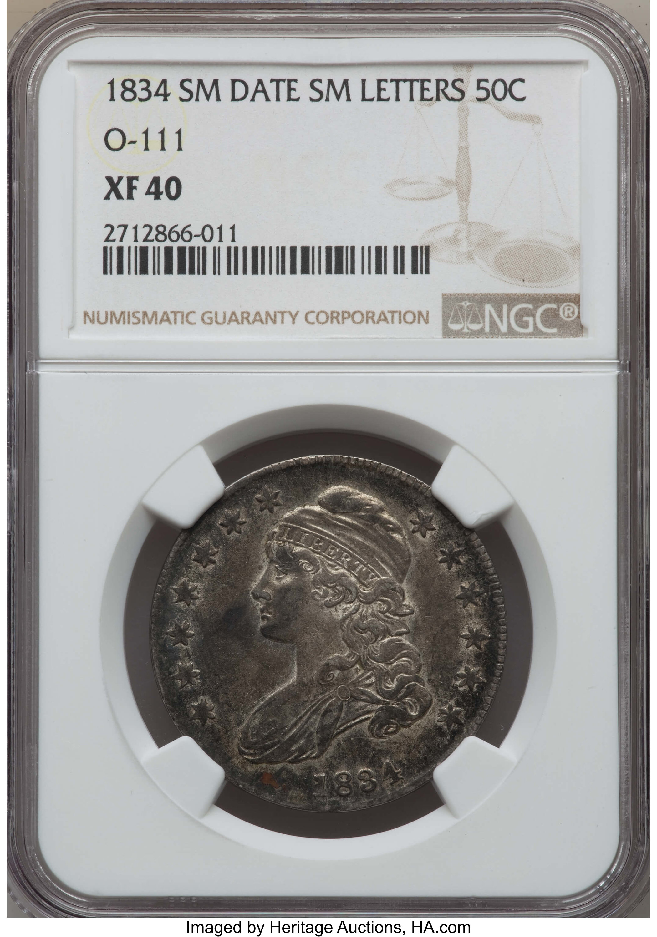 image for: 1834 50C Small Date, Small Letters, O-111, R.1, XF40 NGC. NGC Census: (5/39). PCGS Population: (2/15). CDN: $130 Whsle. Bid...