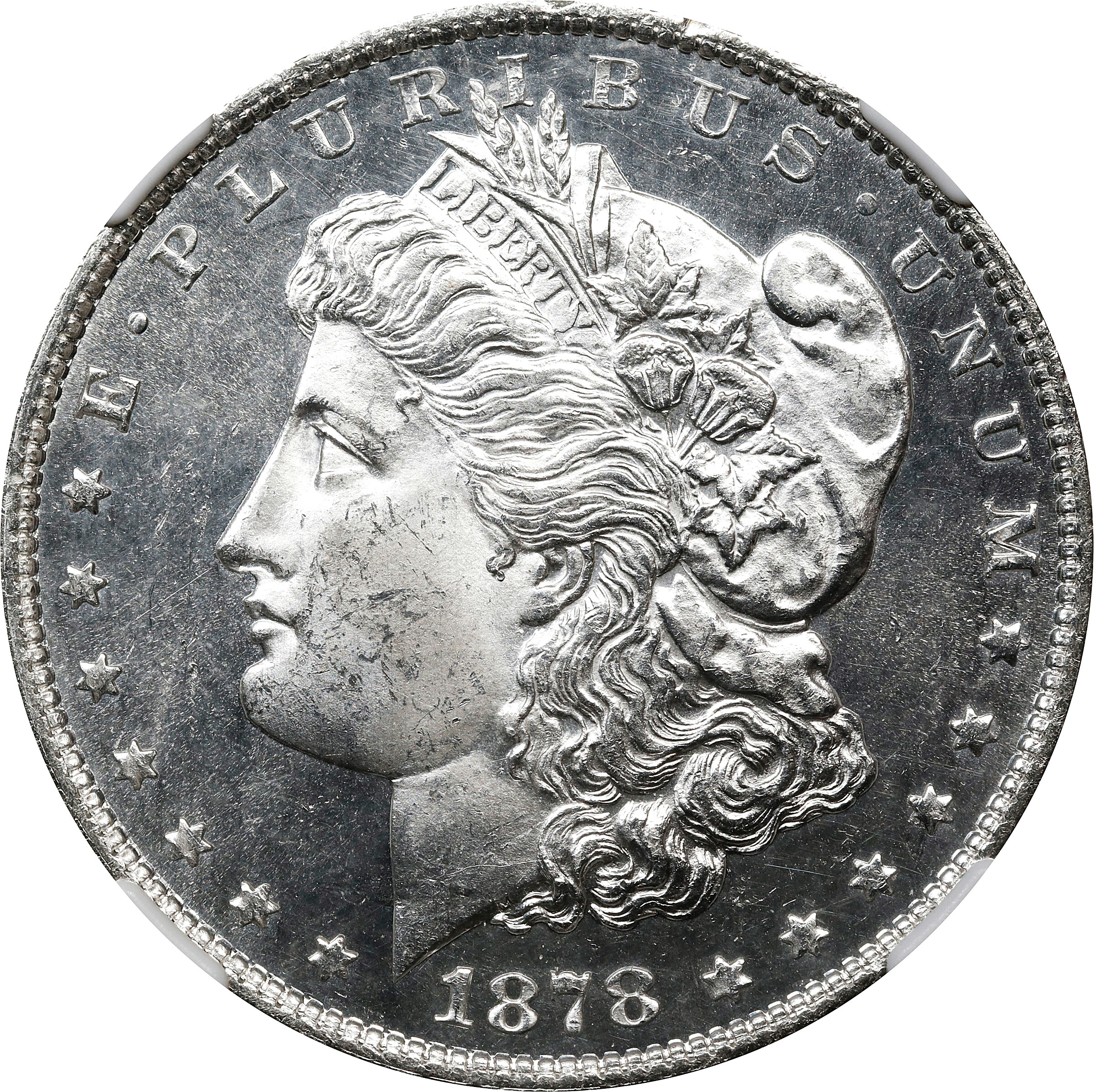 1878 Morgan Silver Dollar. 7 Tailfeathers. Reverse of 1879. MS-63 PL (NGC).