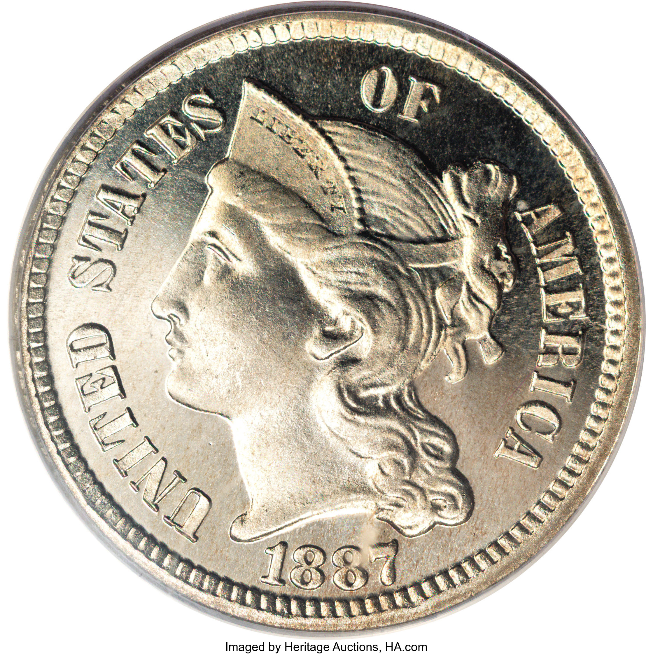 1887 3CN PR66 Cameo PCGS. A hint of rose-gold in the center of the reverse adds color to this moderately reflective and str...