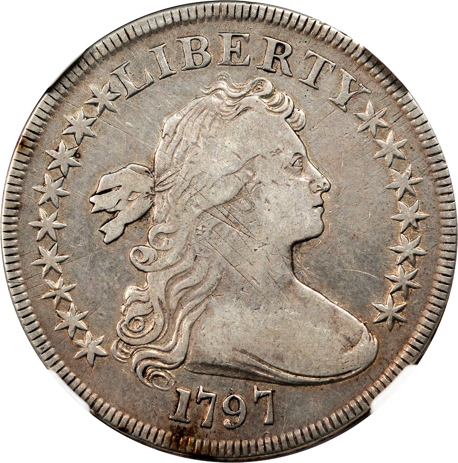 1797 Draped Bust Silver Dollar. B-2, BB-72. Rarity-4. Stars 9x7, Small Letters. Fine-12 (NGC).