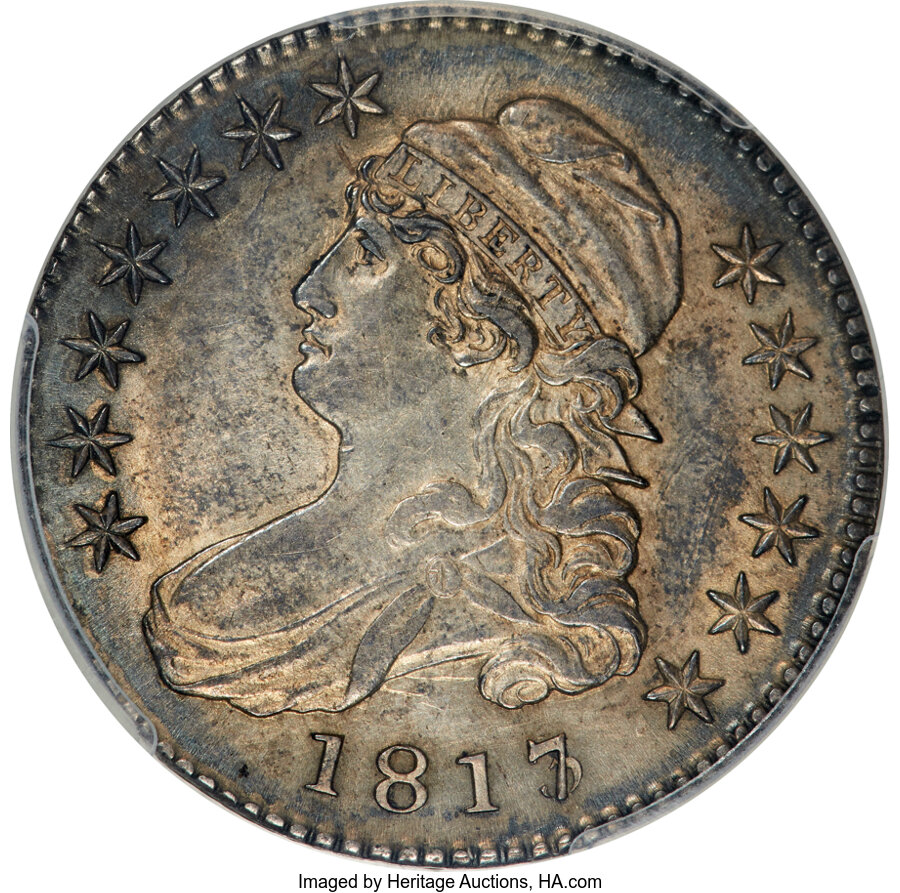 1817/3 50C O-101a, R.1, AU53 PCGS. A prominent, curved die crack curves upward through the 5 in the denomination and double...