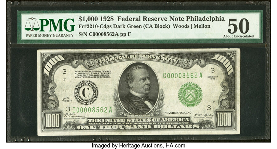 Fr. 2210-C $1,000 1928 Federal Reserve Note. PMG About Uncirculated 50....