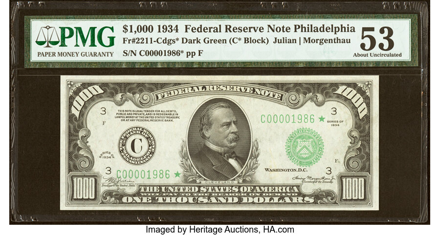 Fr. 2211-C* $1,000 1934 Dark Green Seal Federal Reserve Note. PMG About Uncirculated 53....