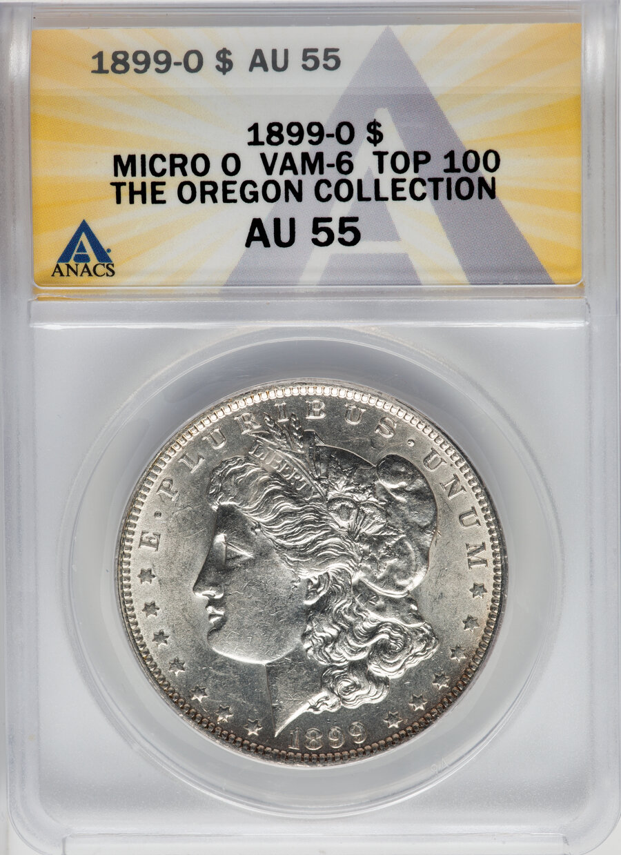 1899-O $1 Micro O, VAM-6, AU55 ANACS. A Top 100 Variety. Ex: The Oregon Collection. Mintage 12,290,000....