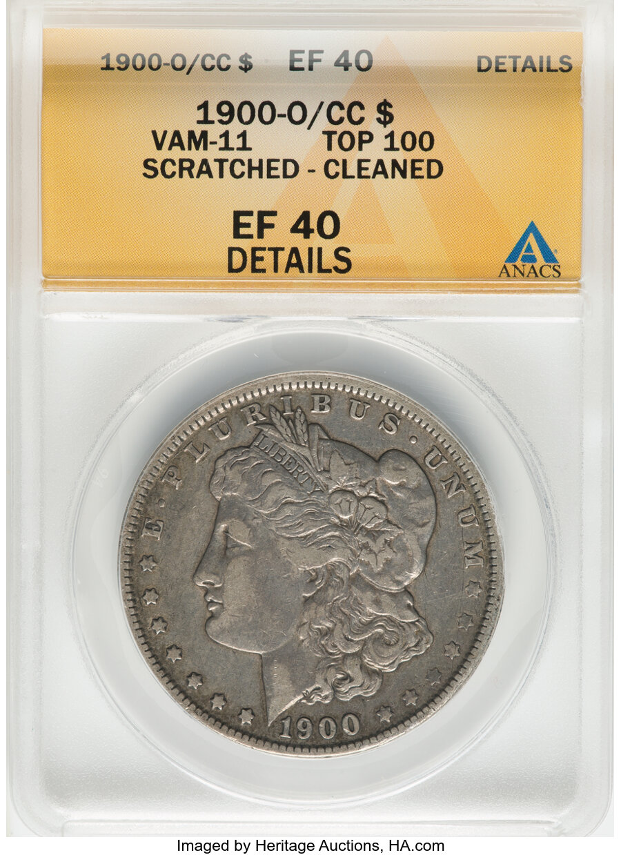 1900-O/CC $1 VAM-11 -- Scratched, Cleaned -- ANACS Details. XF40. A Top 100 Variety. Mintage 12,590,000....