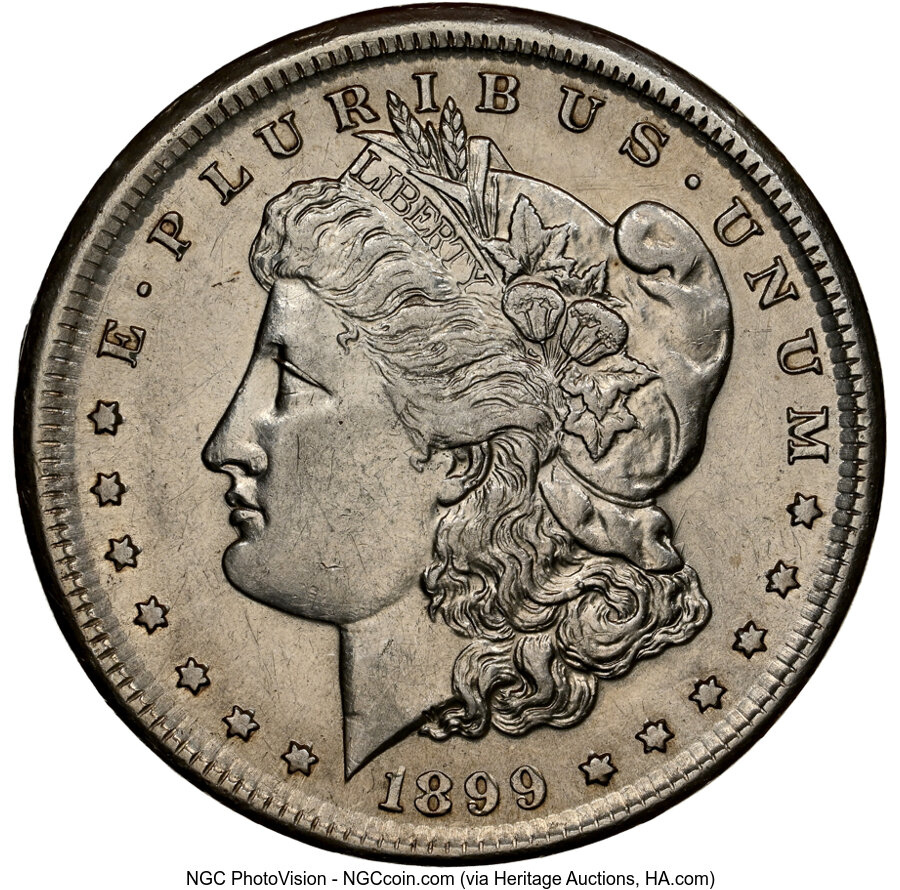 1899-O $1 Morgan Dollar -- Partial Collar -- AU58 NGC....
