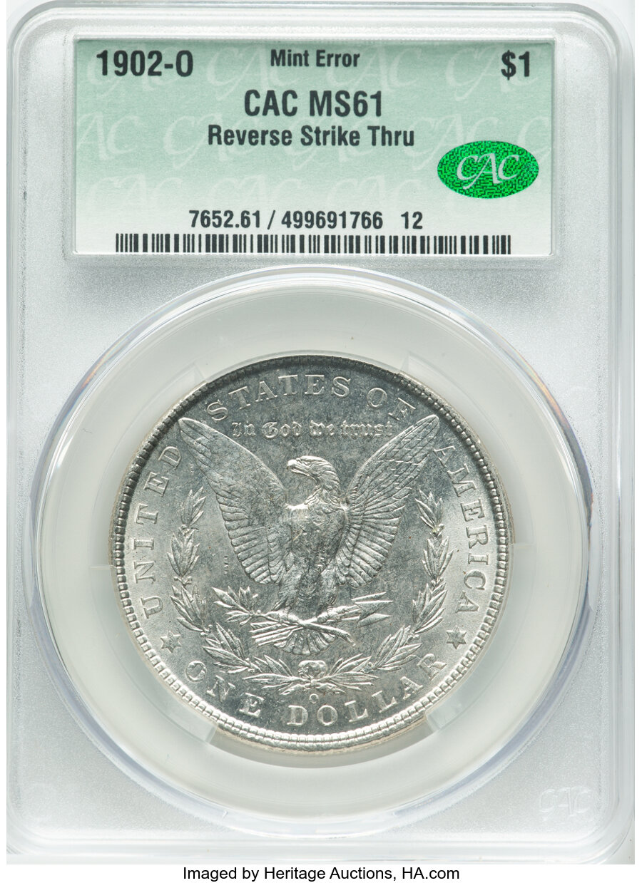 1902-O $1 Morgan Dollar -- Reverse Strike Thru -- MS61 CACG. Mintage 8,636,000....