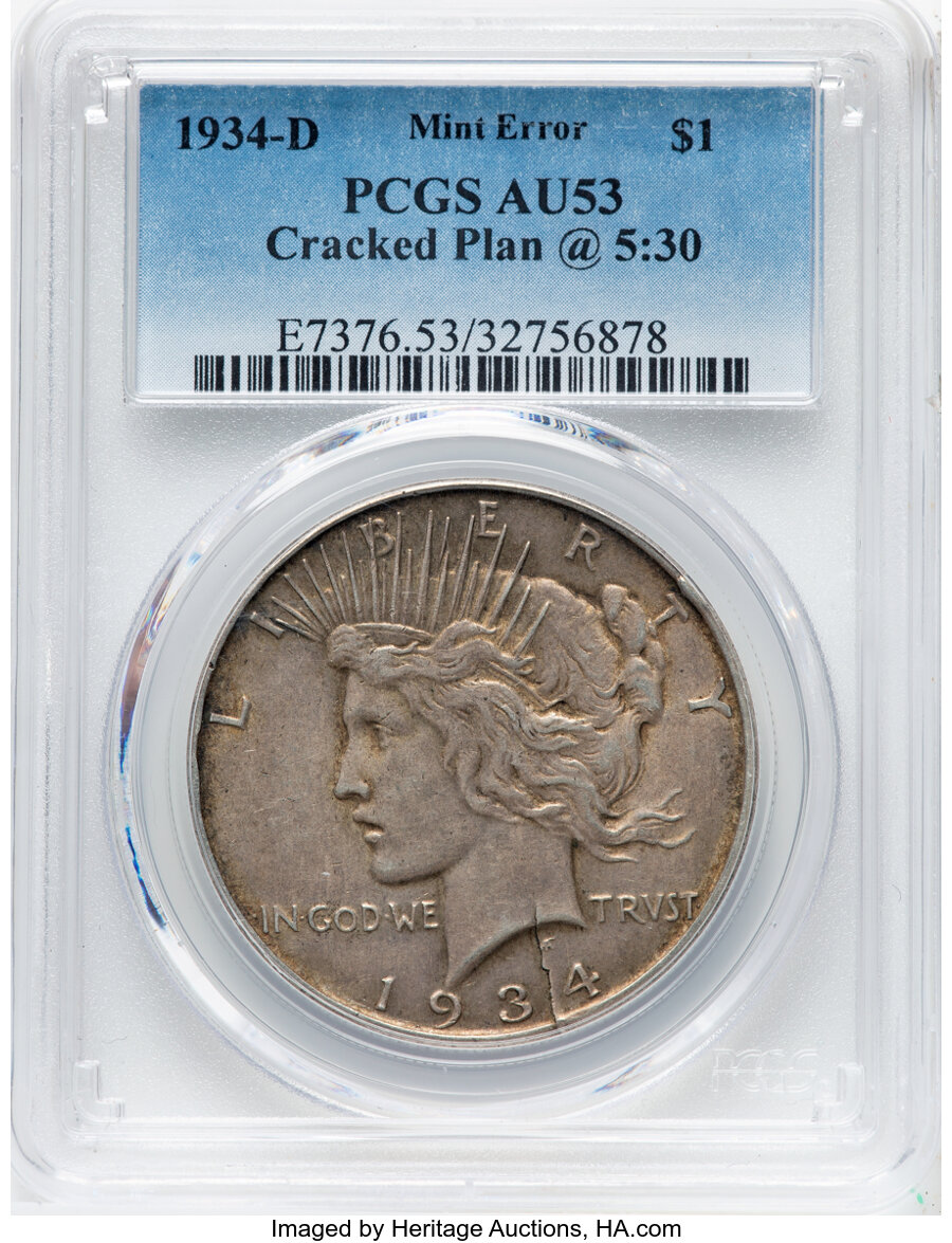 1934-D $1 Peace Dollar -- Cracked Planchet @ 5:30 -- AU53 PCGS. Mintage 1,569,500....