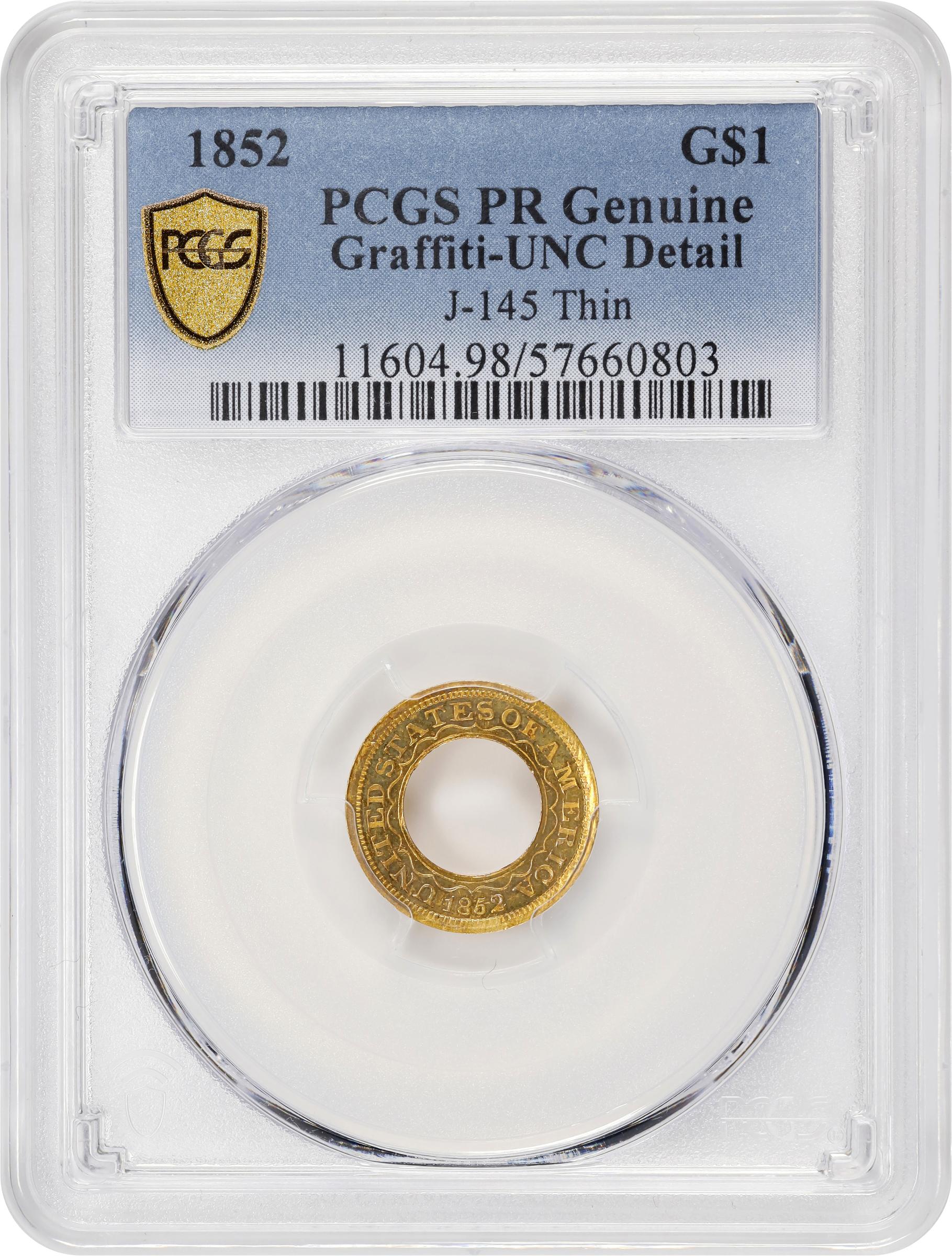 image for: 1852 Pattern Annular, or Ring-Form Gold Dollar. Judd-145, Pollock-173. Rarity-6-. Gold. Plain Edge. Thin Planchet. Proof. Unc Details--Graffiti (PCGS).