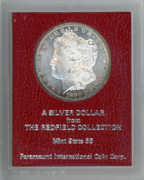 1880-S $1 Morgan Dollar, Uncertified. Ex: Redfield Collection. Housed in a red Mint State 65 Paramount holder....