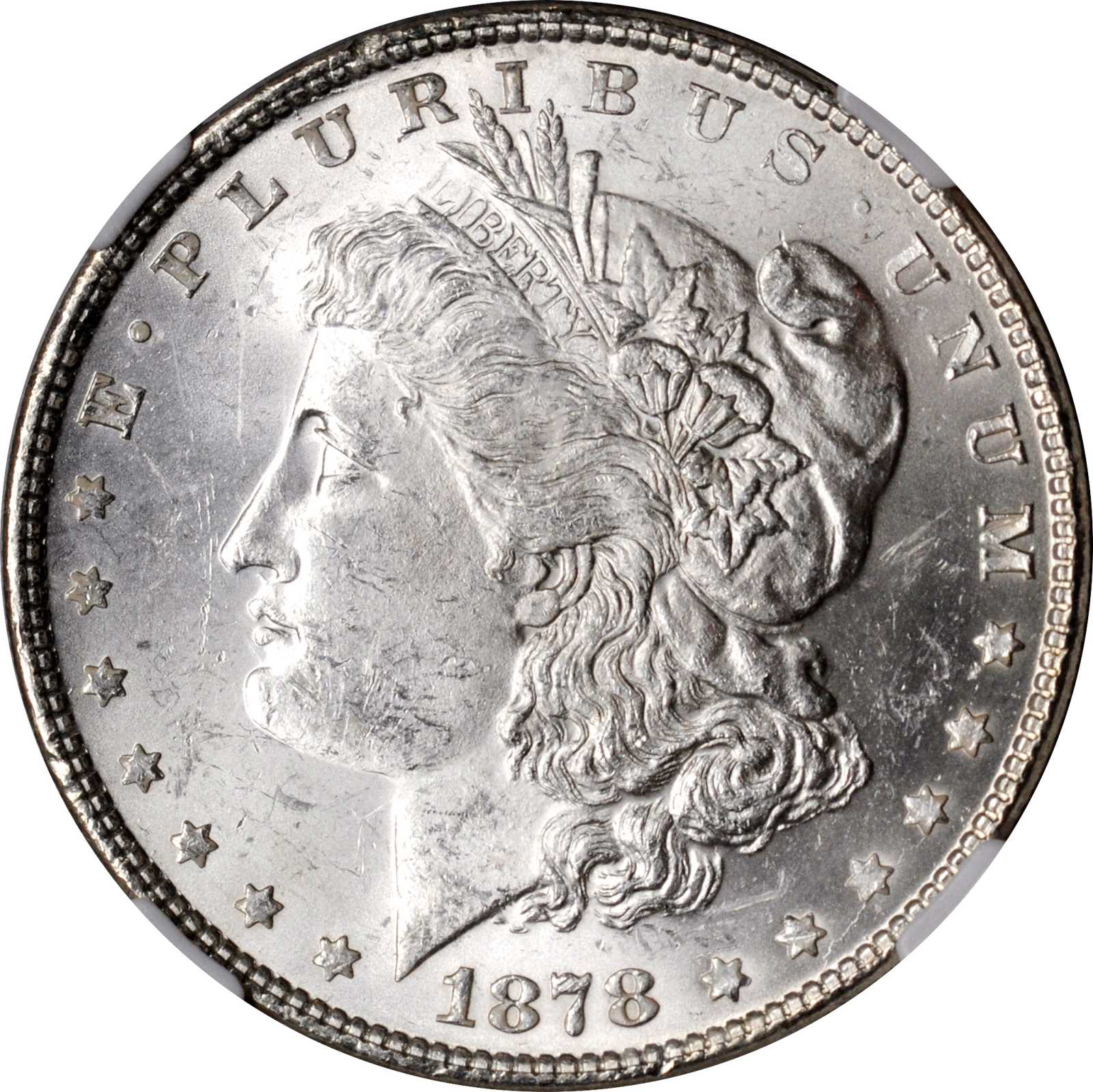 image for: 1878 Morgan Silver Dollar. 7 Tailfeathers. Reverse of 1878. VAM-84. Line Under 8. MS-62 (NGC).