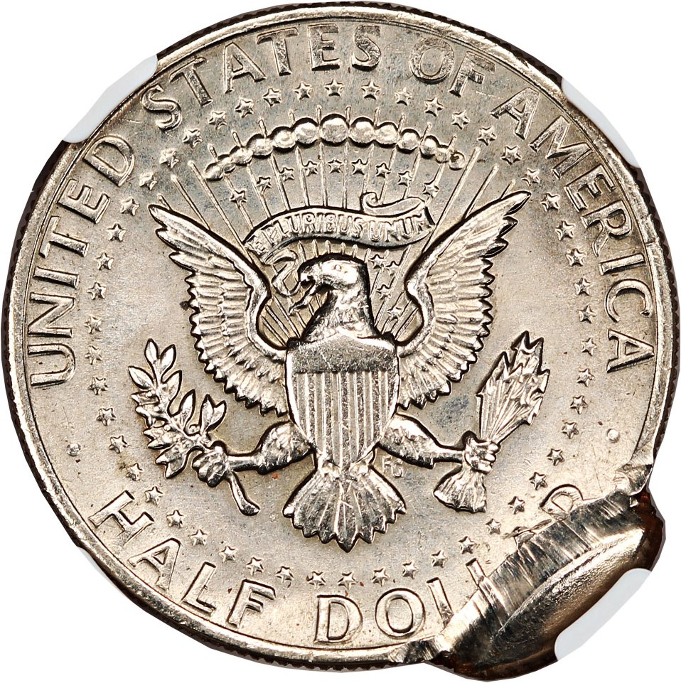 image for: Mint Error: 1977 50c NGC MS64 (Double Struck, 2nd Strike 90% Off Center with Uniface Reverse)