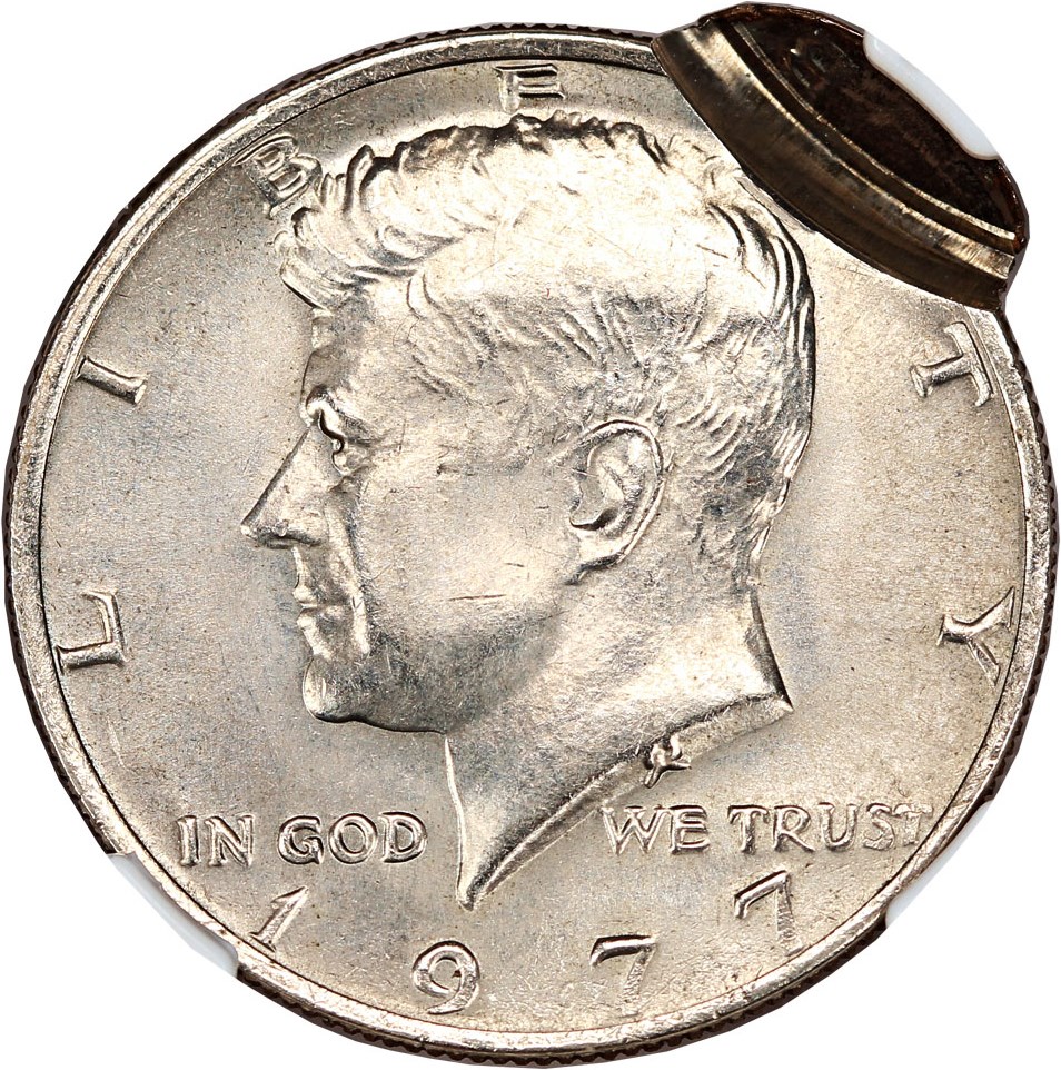 image for: Mint Error: 1977 50c NGC MS64 (Double Struck, 2nd Strike 90% Off Center with Uniface Reverse)